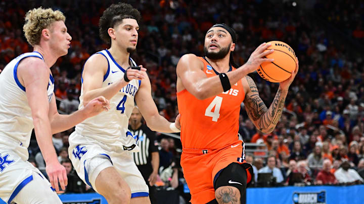 Mar 23, 2025; Milwaukee, WI, USA;  Illinois Fighting Illini guard Kylan Boswell (4) drives to the basket against Kentucky Wildcats guard Koby Brea (4) during the first half in the second round of the NCAA Tournament at Fiserv Forum. Mandatory Credit: Benny Sieu-Imagn Images