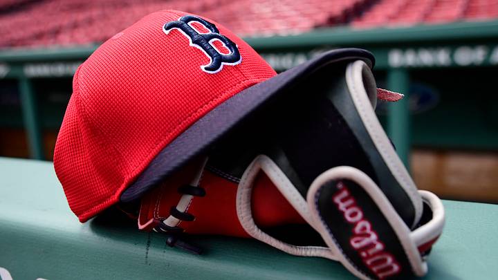 May 18, 2025; Boston, Massachusetts, USA; A Boston Red Sox hat and glove rests on the railing by the dugout prior to a game against the Atlanta Braves at Fenway Park. Mandatory Credit: Bob DeChiara-Imagn Images May 18, 2025; Boston, Massachusetts, USA; A Boston Red Sox hat and glove rests on the railing by the dugout prior to a game against the Atlanta Braves at Fenway Park. Mandatory Credit: Bob DeChiara-Imagn Images