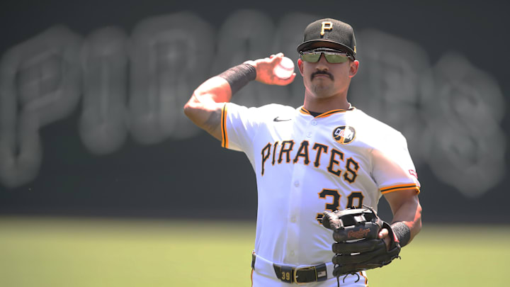 Aug 10, 2025; Pittsburgh, Pennsylvania, USA;  Pittsburgh Pirates second baseman Nick Gonzales (39) warms up before the game against the Cincinnati Reds at PNC Park. Mandatory Credit: Charles LeClaire-Imagn Images
