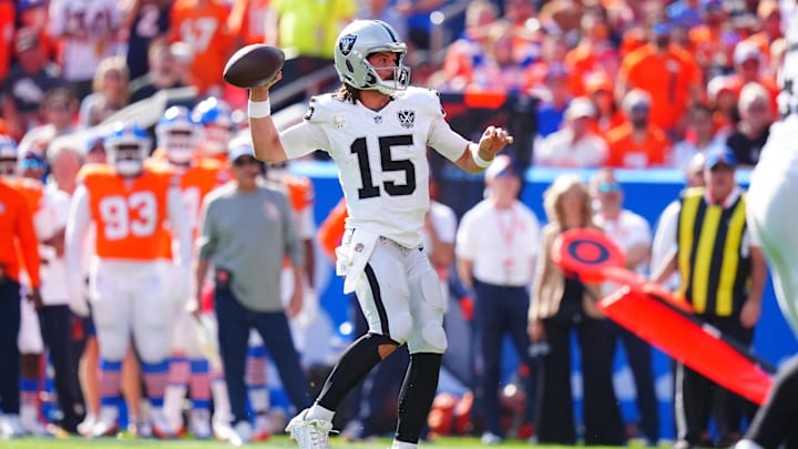 Oct 6, 2024; Denver, Colorado, USA; Las Vegas Raiders quarterback Gardner Minshew (15) prepares to pass in the second quarter against the Denver Broncos at Empower Field at Mile High. Mandatory Credit: Ron Chenoy-Imagn Images Oct 6, 2024; Denver, Colorado, USA; Las Vegas Raiders quarterback Gardner Minshew (15) prepares to pass in the second quarter against the Denver Broncos at Empower Field at Mile High. Mandatory Credit: Ron Chenoy-Imagn Images