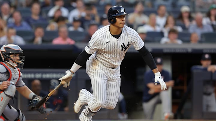 May 8, 2024; Bronx, New York, USA; New York Yankees right fielder Juan Soto (22) follows through on an RBI infield single during the second inning against the Houston Astros at Yankee Stadium. May 8, 2024; Bronx, New York, USA; New York Yankees right fielder Juan Soto (22) follows through on an RBI infield single during the second inning against the Houston Astros at Yankee Stadium.