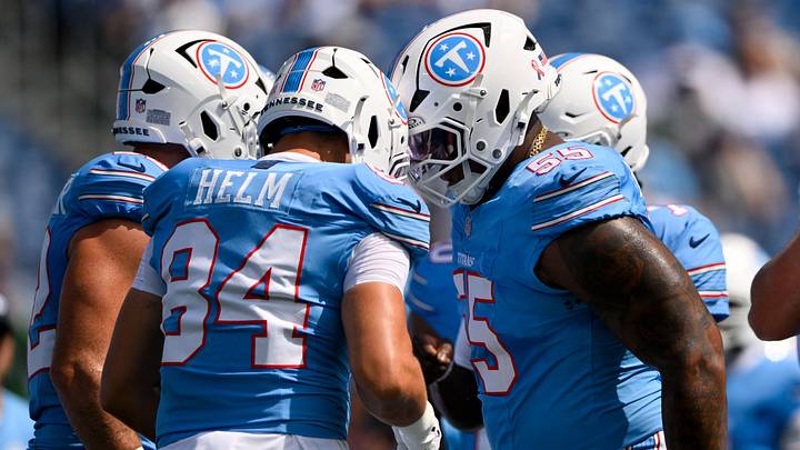 Sep 13, 2026; Nashville, Tennessee, USA; Tennessee Titans offensive tackle JC Latham (55) head butts tight end Gunnar Helm (84) against the New York Jets during pre-game warmups at Nissan Stadium. Mandatory Credit: Steve Roberts-Imagn Images Sep 13, 2026; Nashville, Tennessee, USA; Tennessee Titans offensive tackle JC Latham (55) head butts tight end Gunnar Helm (84) against the New York Jets during pre-game warmups at Nissan Stadium. Mandatory Credit: Steve Roberts-Imagn Images