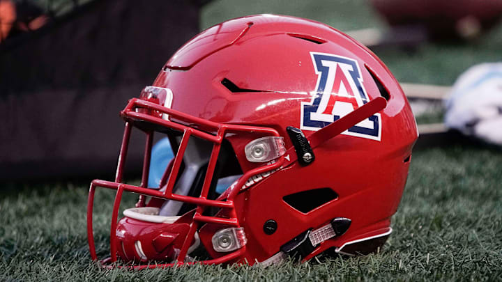 Oct 21, 2017; Berkeley, CA, USA; Arizona Wildcats helmet sits on the grass in the game against the California Golden Bears during the second quarter at Memorial Stadium. Mandatory Credit: Stan Szeto-Imagn Images