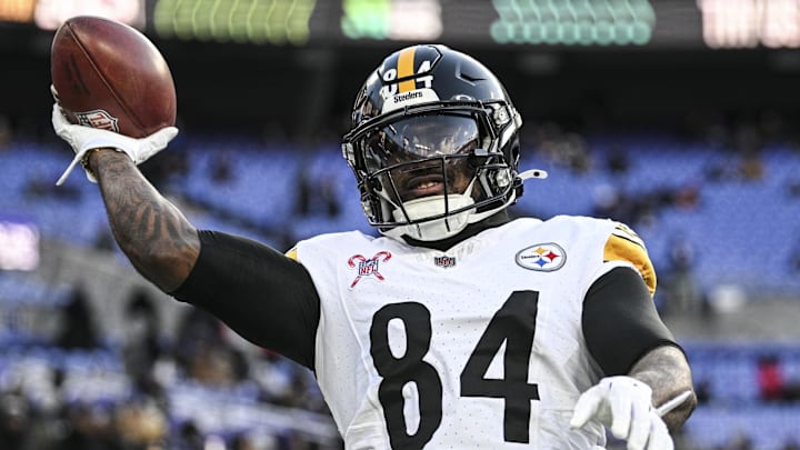 Dec 21, 2024; Baltimore, Maryland, USA;  Pittsburgh Steelers running back Cordarrelle Patterson (84) throws the ball to fans before the game against the Baltimore Ravens at M&T Bank Stadium. Mandatory Credit: Tommy Gilligan-Imagn Images