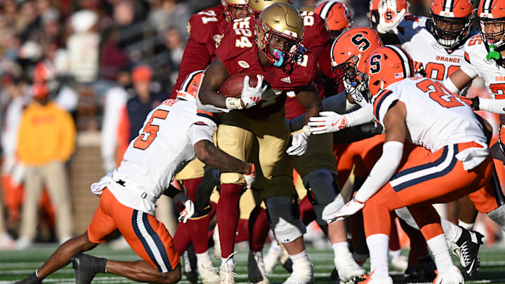 Nov 9, 2024; Chestnut Hill, Massachusetts, USA; Boston College Eagles running back Jordan McDonald (24) runs against the Syracuse Orange during the second half at Alumni Stadium. Mandatory Credit: Brian Fluharty-Imagn Images