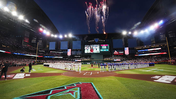 The players take the field as the Arizona Diamondbacks play their Opening Day game against the Chicago Cubs at Chase Field in Phoenix, on March 27, 2025.