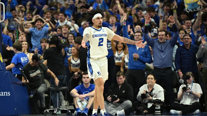 Dec 4, 2024; Omaha, Nebraska, USA; Creighton Bluejays guard Pop Isaacs (2) reacts to the crowd after making a three point basket against the Kansas Jayhawks during the second half at CHI Health Center Omaha. Mandatory Credit: Steven Branscombe-Imagn Images