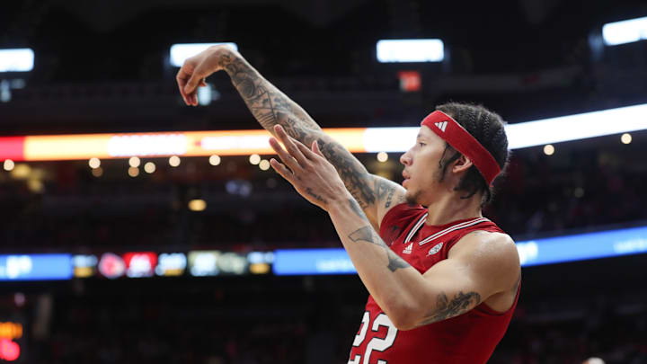 Louisville   s Tre White makes the basket against Georgia Tech Saturday night in the KFC Yum