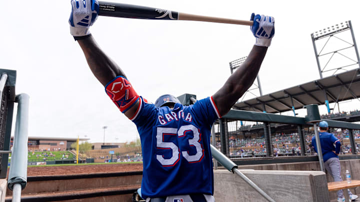 Mar 6, 2024; Salt River Pima-Maricopa, Arizona, USA; Texas Rangers designated hitter Adolis Garcia
