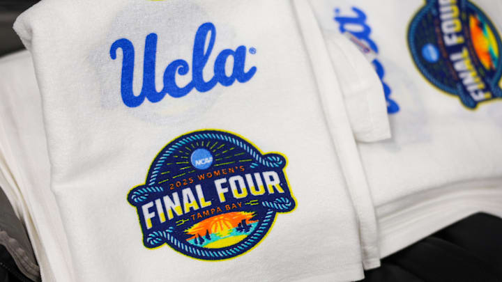 Apr 3, 2025; Tampa, FL, USA; UCLA towels sit on the court before the NCAA Woman’s Final Four at Amalie Arena. Mandatory Credit: Nathan Ray Seebeck-Imagn Images