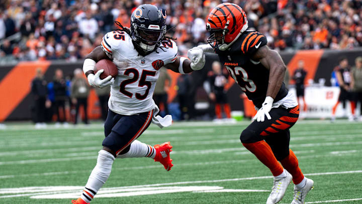 Chicago Bears running back Kyle Monangai (25) stiff arms Cincinnati Bengals cornerback Dax Hill (23) in the second quarter of the NFL football game between Chicago Bears and Cincinnati Bengals at Paycor Stadium in Cincinnati on Nov. 2, 2025.