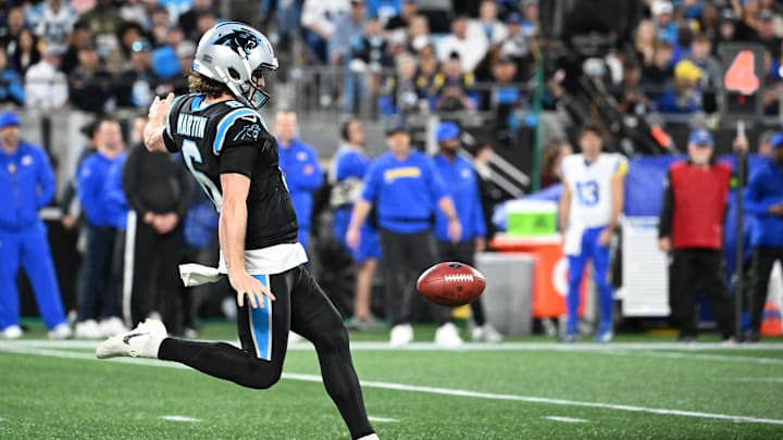 Jan 10, 2026; Charlotte, NC, USA; Carolina Panthers punter Sam Martin (6) punts in the second quarter in an NFC Wild Card Round game at Bank of America Stadium. Mandatory Credit: Bob Donnan-Imagn Images