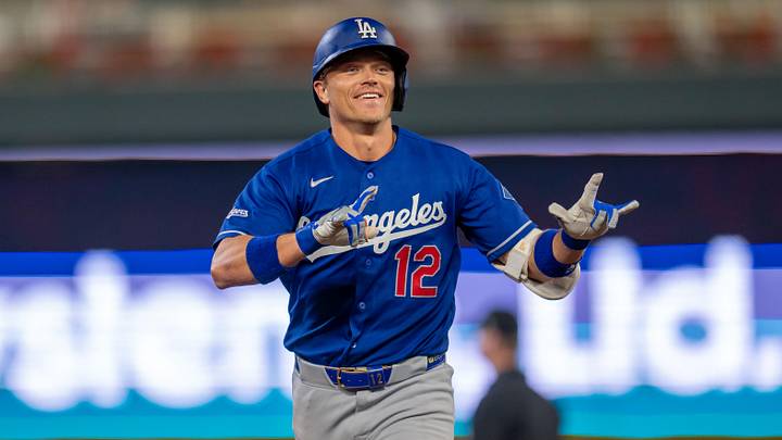 Jun 23, 2026; Minneapolis, Minnesota, USA; Los Angeles Dodgers right fielder Alex Call (12) celebrates hitting a home run against the Minnesota Twins in the eighth inning at Target Field. Mandatory Credit: Jesse Johnson-Imagn Images