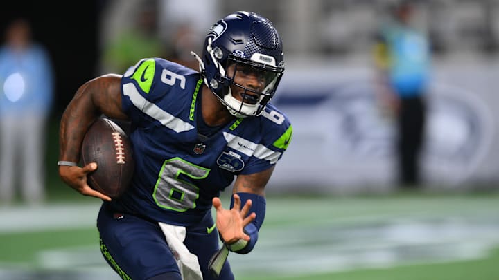 Seattle Seahawks quarterback Jalen Milroe (6) carries the ball against the Las Vegas Raiders during the second half at Lumen Field. 