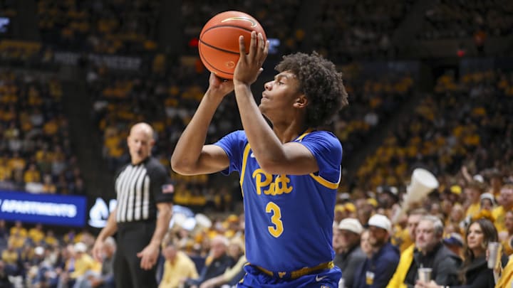 Nov 13, 2025; Morgantown, West Virginia, USA; Pittsburgh Panthers guard Brandin Cummings (3) shoots a three pointer during the first half against the West Virginia Mountaineers at WVU Coliseum. Mandatory Credit: Ben Queen-Imagn Images