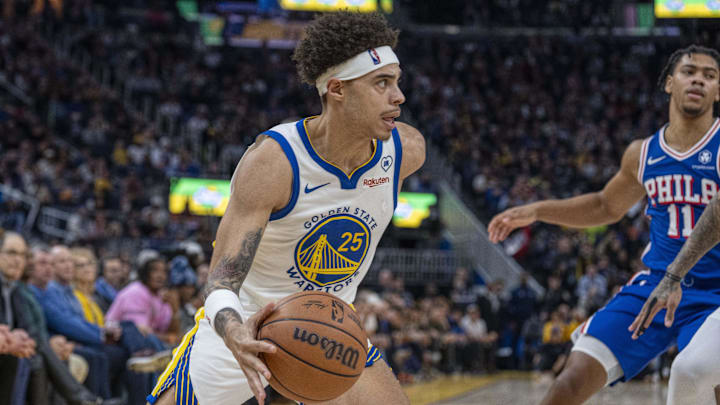 Jan 30, 2024; San Francisco, California, USA;  Golden State Warriors guard Lester Quinones (25) drives against the Philadelphia 76ers during the third quarter at Chase Center. Mandatory Credit: Neville E. Guard-Imagn Images