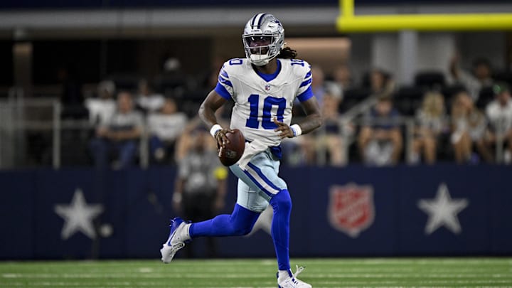 Dallas Cowboys quarterback Joe Milton III runs with the ball during the second half against the Baltimore Ravens