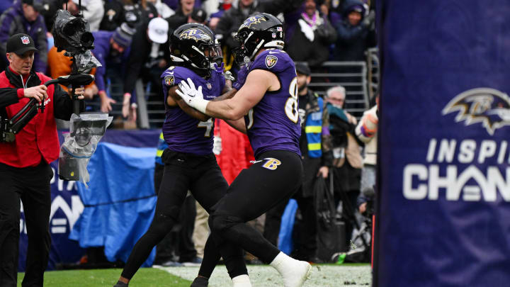Jan 28, 2024; Baltimore, Maryland, USA; Baltimore Ravens wide receiver Zay Flowers (4) celebrates with tight end Mark Andrews (89) after scoring a touchdown against the Kansas City Chiefs during the first half in the AFC Championship football game at M&T Bank Stadium. Mandatory Credit: Tommy Gilligan-USA TODAY Sports