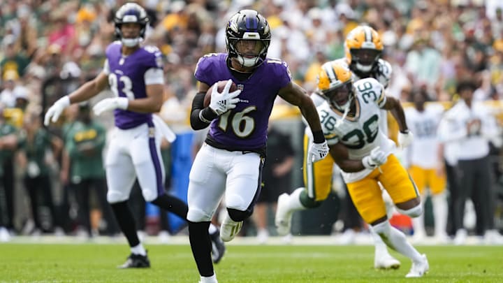 Aug 24, 2024; Green Bay, Wisconsin, USA; Baltimore Ravens wide receiver Tylan Wallace (16) rushes with the football after catching a pass before scoring a touchdown during the second quarter against the Green Bay Packers at Lambeau Field. Mandatory Credit: Jeff Hanisch-Imagn Images Aug 24, 2024; Green Bay, Wisconsin, USA; Baltimore Ravens wide receiver Tylan Wallace (16) rushes with the football after catching a pass before scoring a touchdown during the second quarter against the Green Bay Packers at Lambeau Field. Mandatory Credit: Jeff Hanisch-Imagn Images