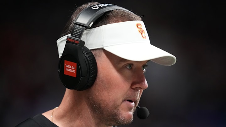 Dec 30, 2025; San Antonio, TX, USA; Southern California Trojans head coach Lincoln Riley watches in the first half against the TCU Horned Frogs during the Alamo Bowl at Alamodome. 