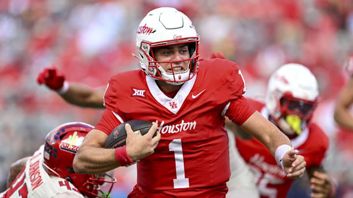 Oct 18, 2025; Houston, Texas, USA; Houston Cougars quarterback Conner Weigman (1) runs the ball into the end zone for a touchdown during the second quarter against the Arizona Wildcats at TDECU Stadium. Mandatory Credit: Maria Lysaker-Imagn Images 