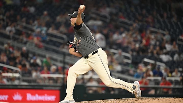 Aug 2, 2024; Washington, District of Columbia, USA; Washington Nationals relief pitcher Robert Garcia (61) throws a pitch against the Milwaukee Brewers during the sixth inning at Nationals Park. 