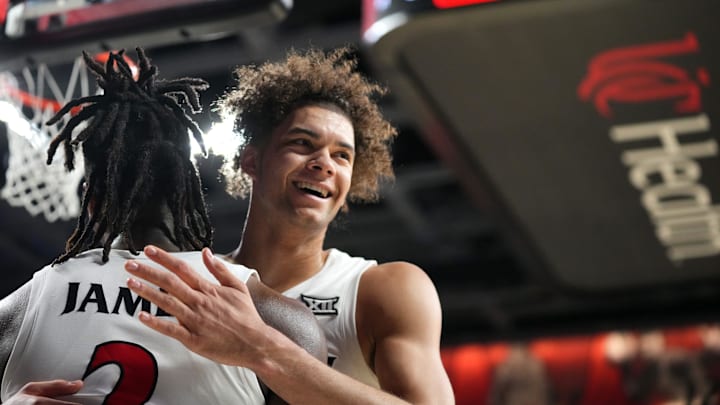 Cincinnati Bearcats guard Dan Skillings Jr. (0) and Cincinnati Bearcats guard Jizzle James (2) embrace in the second half of a college basketball game against the Bradley Braves during a second-round game of the National Invitation Tournament,, Saturday, March 23, 2024, at Fifth Third Arena in Cincinnati. Cincinnati Bearcats guard Dan Skillings Jr. (0) and Cincinnati Bearcats guard Jizzle James (2) embrace in the second half of a college basketball game against the Bradley Braves during a second-round game of the National Invitation Tournament,, Saturday, March 23, 2024, at Fifth Third Arena in Cincinnati.