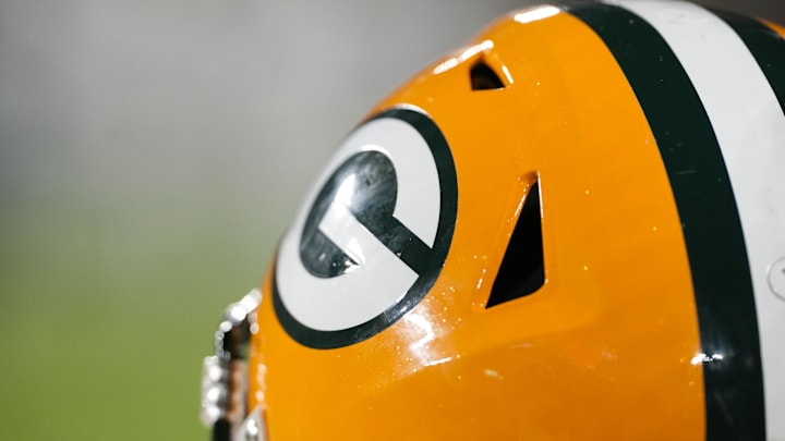 Nov 28, 2024; Green Bay, Wisconsin, USA; General view of a Green Bay Packers helmet during the game against the Miami Dolphins at Lambeau Field. Mandatory Credit: Jeff Hanisch-Imagn Images Nov 28, 2024; Green Bay, Wisconsin, USA; General view of a Green Bay Packers helmet during the game against the Miami Dolphins at Lambeau Field. Mandatory Credit: Jeff Hanisch-Imagn Images
