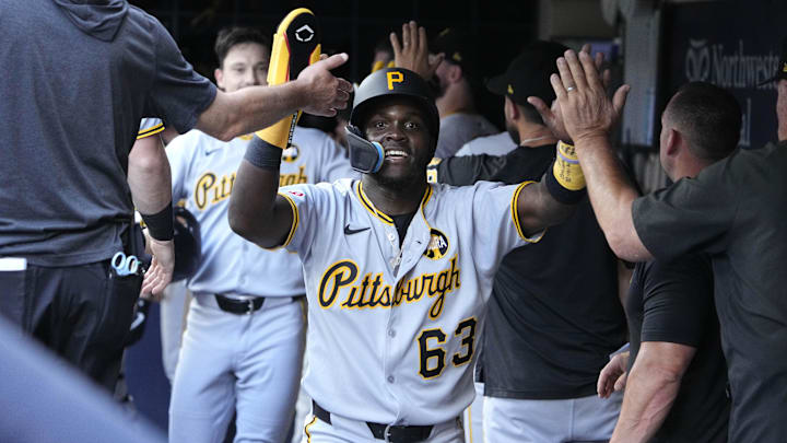 Aug 13, 2025; Milwaukee, Wisconsin, USA; Pittsburgh Pirates outfielder Ronny Simon (63) celebrates a home run by outfielder Bryan Reynolds against the Milwaukee Brewers in the sixth inning at American Family Field. Mandatory Credit: Michael McLoone-Imagn Images