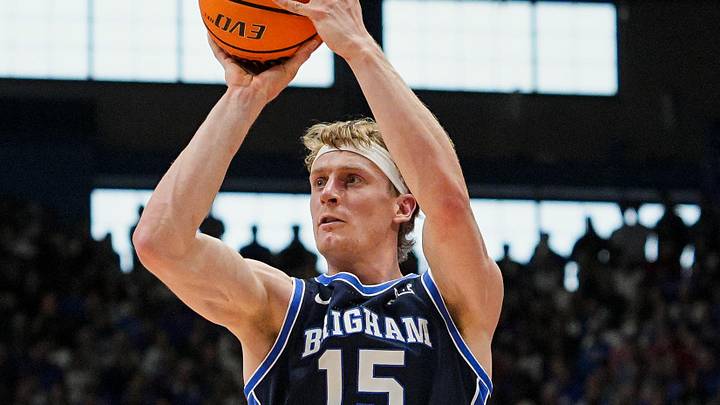 Jan 31, 2026; Lawrence, Kansas, USA; BYU Cougars guard Richie Saunders (15) shoots during the first half against the Kansas Jayhawks at Mizzou Arena. Mandatory Credit: Jay Biggerstaff-Imagn Images