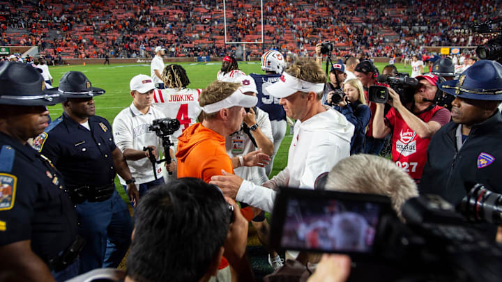 Auburn Tigers head coach Hugh Freeze and Mississippi Rebels head coach Lane Kiffin shake hands after the game as Auburn Tigers take on Mississippi Rebels at Jordan-Hare Stadium in Auburn, Ala., on Saturday, Oct. 21, 2023. Mississippi Rebels defeated Auburn Tigers 28-21.