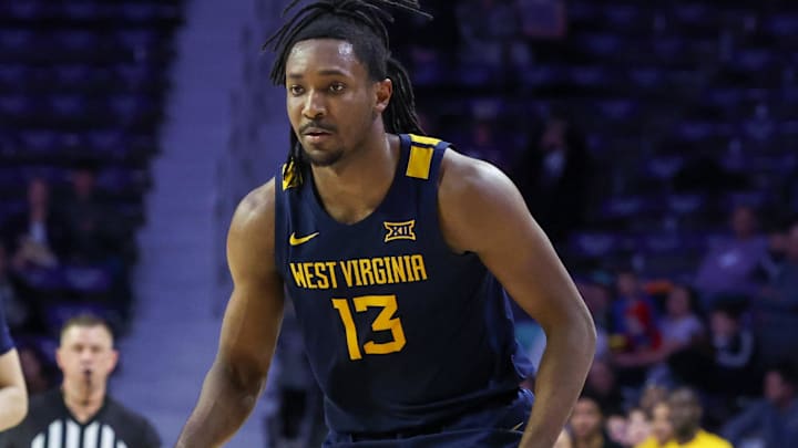 Mar 3, 2026; Manhattan, Kansas, USA; West Virginia Mountaineers guard Chance Moore (13) dribbles during the first half against the Kansas State Wildcats at Bramlage Coliseum. Mandatory Credit: Scott Sewell-Imagn Images