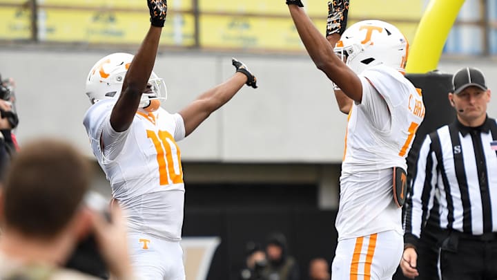 Nov 30, 2024; Nashville, Tennessee, USA;  Tennessee Volunteers wide receiver Mike Matthews (10) celebrates his touchdown with wide receiver Chris Brazzell II (17) against the Vanderbilt Commodores during the second half at FirstBank Stadium. Mandatory Credit: Steve Roberts-Imagn Images