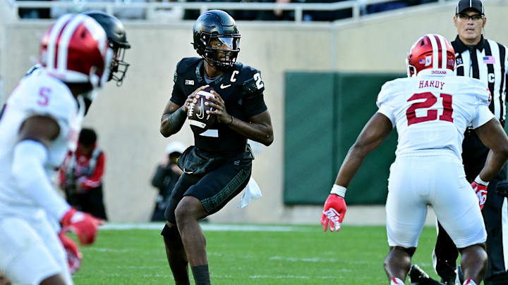 Nov 2, 2024; East Lansing, Michigan, USA; Michigan State Spartans quarterback Aidan Chiles (2) looks for an open receiver during the third quarter against the Indiana Hoosiers at Spartan Stadium. Mandatory Credit: Dale Young-Imagn Images Nov 2, 2024; East Lansing, Michigan, USA; Michigan State Spartans quarterback Aidan Chiles (2) looks for an open receiver during the third quarter against the Indiana Hoosiers at Spartan Stadium. Mandatory Credit: Dale Young-Imagn Images