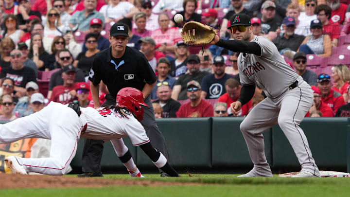 Reds Elly De La Cruz (44) makes it back to first in time during the Reds vs. Diamondbacks game on Reds Elly De La Cruz (44) makes it back to first in time during the Reds vs. Diamondbacks game on
