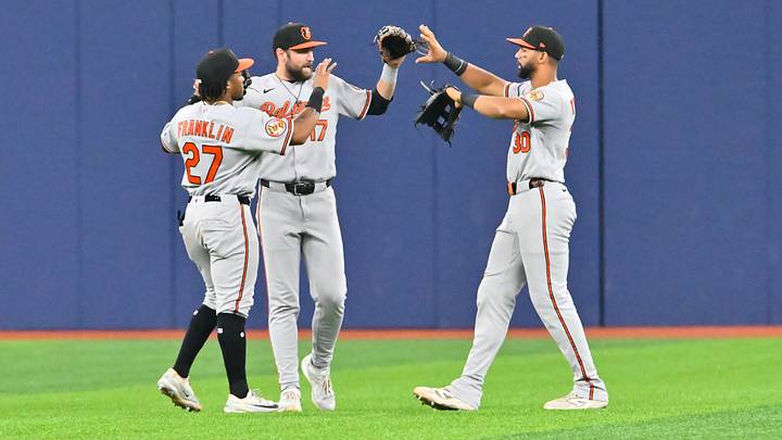 Aug 15, 2026; St. Petersburg, Florida, USA; Baltimore Orioles teammates celebrate a win in the ten innings against Tampa Bay Rays at Tropicana Field. Mandatory Credit: Pablo Robles-Imagn Images