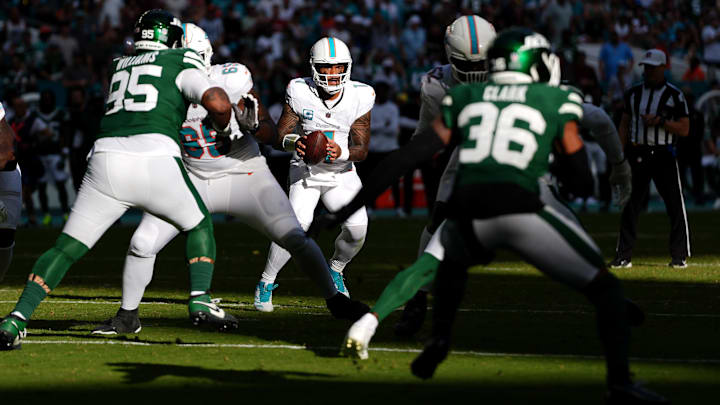 Miami Dolphins quarterback Tua Tagovailoa (1) drops back with the ball during the second half against the New York Jets at Hard Rock Stadium in Week 14.