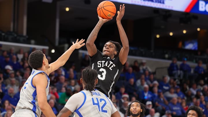 Dec 21, 2024; Memphis, Tennessee, USA; Mississippi State Bulldogs forward KeShawn Murphy (3) shoots the ball as Memphis Tigers forward Nicholas Jourdain (2) defends during the second half at FedExForum. Mandatory Credit: Wesley Hale-Imagn Images Dec 21, 2024; Memphis, Tennessee, USA; Mississippi State Bulldogs forward KeShawn Murphy (3) shoots the ball as Memphis Tigers forward Nicholas Jourdain (2) defends during the second half at FedExForum. Mandatory Credit: Wesley Hale-Imagn Images