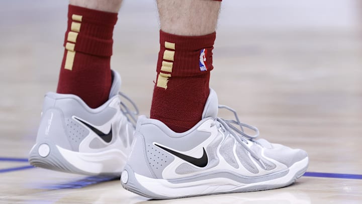 Mar 28, 2025; Detroit, Michigan, USA;  A detailed view of the shoes worn by Cleveland Cavaliers forward Dean Wade (32) in the first half against the Detroit Pistons at Little Caesars Arena. Mandatory Credit: Rick Osentoski-Imagn Images