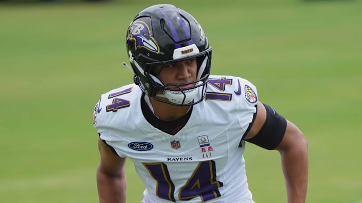 Jul 24, 2025; Owings Mills, MD, USA; Baltimore Ravens safety Kyle Hamilton (14) runs drills during training camp at the Under Armour Performance Center. Mandatory Credit: Mitch Stringer-Imagn Images