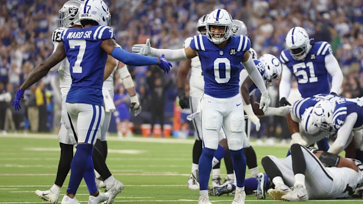 Oct 5, 2025; Indianapolis, Indiana, USA; Indianapolis Colts safety Cam Bynum (0) high fives cornerback Charvarius Ward (7) after an interception against the Las Vegas Raiders during the second quarter at Lucas Oil Stadium. Mandatory Credit: Trevor Ruszkowski-Imagn Images