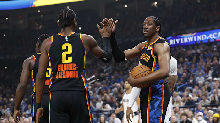 Nov 17, 2024; Oklahoma City, Oklahoma, USA; Oklahoma City Thunder guard Shai Gilgeous-Alexander (2) and forward Jalen Williams (8) high five after a play against the Dallas Mavericks during the first quarter at Paycom Center. Mandatory Credit: Alonzo Adams-Imagn Images