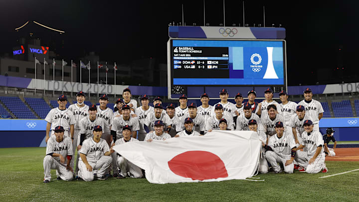 Aug 7, 2021; Yokohama, Japan; Japan players celebrate after defeating USA in the baseball gold medal match during the Tokyo 2020 Olympic Summer Games at Yokohama Baseball Stadium.