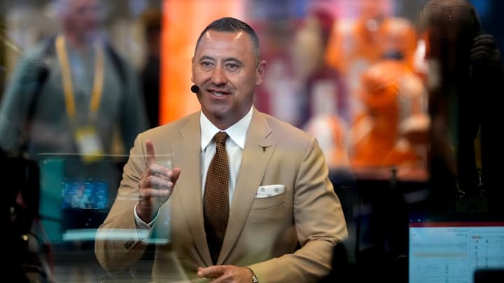 July 15, 2025; Atlanta, GA, USA; Texas head coach Steve Sarkisian is interviewed by one of the TV media teams during SEC Media Days at the College Football Hall of Fame in Atlanta.