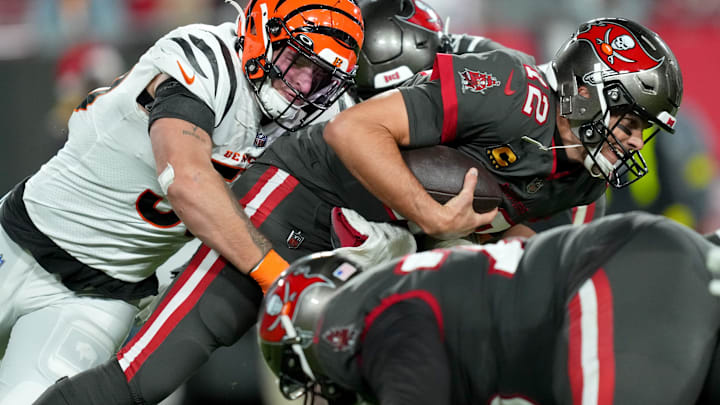 Cincinnati Bengals linebacker Logan Wilson (55) sacks Tampa Bay Buccaneers quarterback Tom Brady (12)