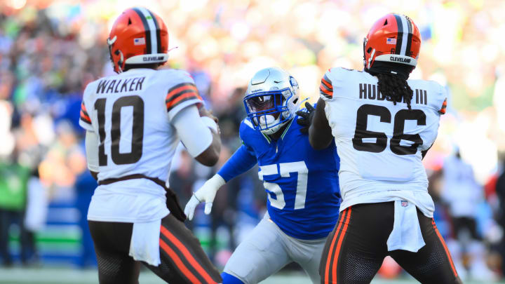 Oct 29, 2023; Seattle, Washington, USA; Seattle Seahawks defensive end Frank Clark (57) is blocked by Cleveland Browns offensive tackle James Hudson III (66) while quarterback PJ Walker (10) looks to pass during the second half at Lumen Field. Mandatory Credit: Steven Bisig-USA TODAY Sports