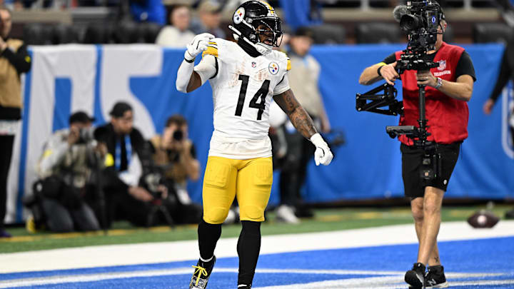 Dec 21, 2025; Detroit, Michigan, USA; Pittsburgh Steelers running back Kenneth Gainwell (14) celebrates after a touchdown during the third quarter against the Detroit Lions at Ford Field. Mandatory Credit: Lon Horwedel-Imagn Images