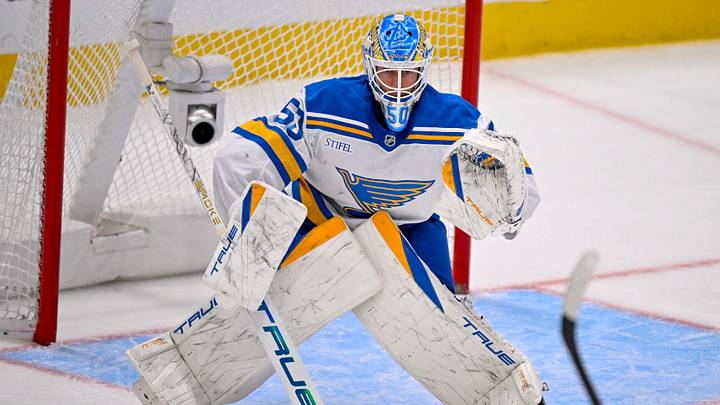 Feb 4, 2026; Dallas, Texas, USA; St. Louis Blues goaltender Jordan Binnington (50) faces the Dallas Stars attack during the third period at the American Airlines Center. Mandatory Credit: Jerome Miron-Imagn Images