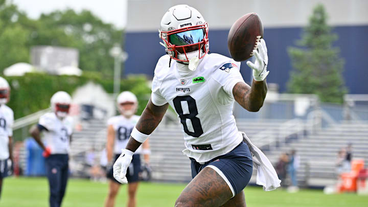 Jun 9, 2025; Foxborough, MA, USA; New England Patriots wide receiver Stefon Diggs (8) tries to catch the ball during minicamp at Gillette Stadium. Mandatory Credit: Eric Canha-Imagn Images