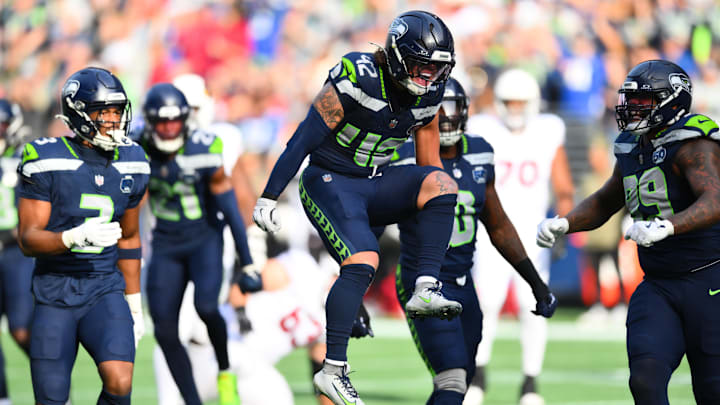Nov 9, 2025; Seattle, Washington, USA; Seattle Seahawks linebacker Drake Thomas (42) celebrates a defensive stop during the first quarter against the Arizona Cardinals at Lumen Field.